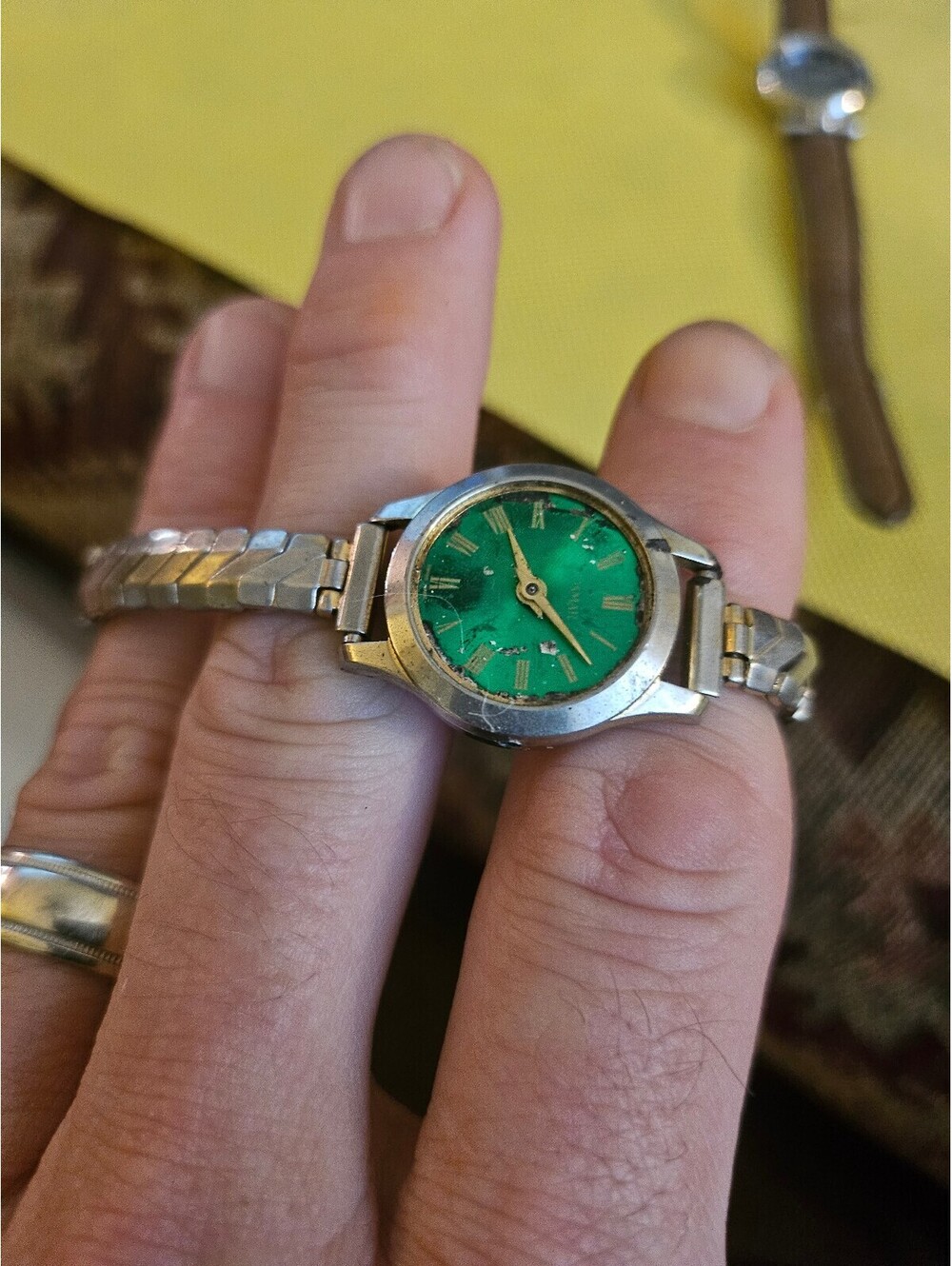 Vintage Ladies watch with green face(no glass) silver band as is untested brand?